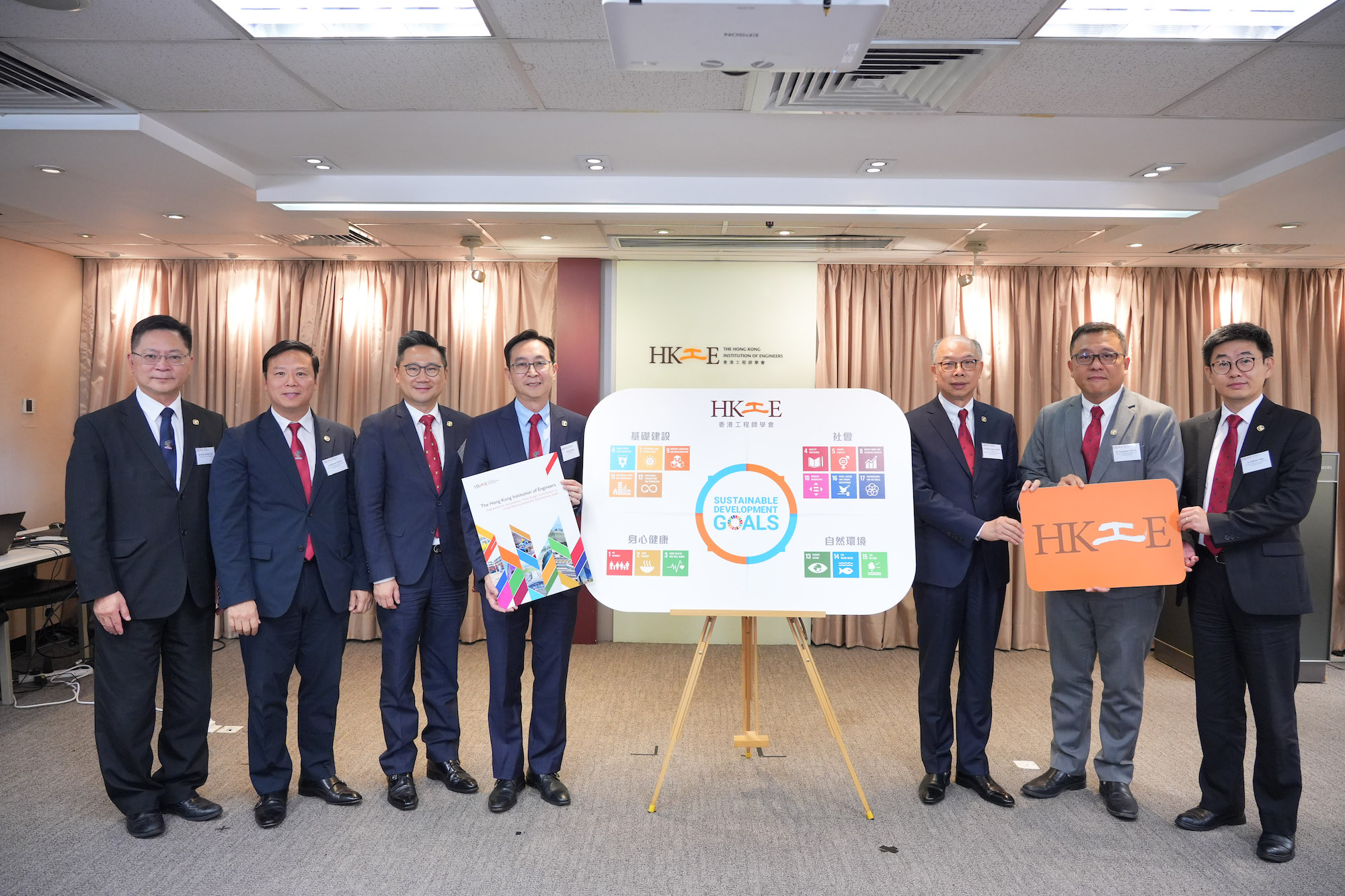 Ir Eric MA, President (4th left), Ir Prof Frank CHAN, Vice President cum Advisor of the Working Group (3rd right), Ir Wilson KWOK, Chairman of the Working Group (3rd left), Ir Norman CHAN, Member of Working Group (2nd right), Ir Kelvin TANG, Member of Working Group (2nd left), Ir ZHOU Yan, Member of Working Group (1st right), and Ir Prof Alfred SIT, Chief Executive and Secretary (1st left) attended the launch of HKIEs UNSDGs eBook Engineered for Sustainability: Hong Kongs Contribution to United Nations Sustainable Development Goals.